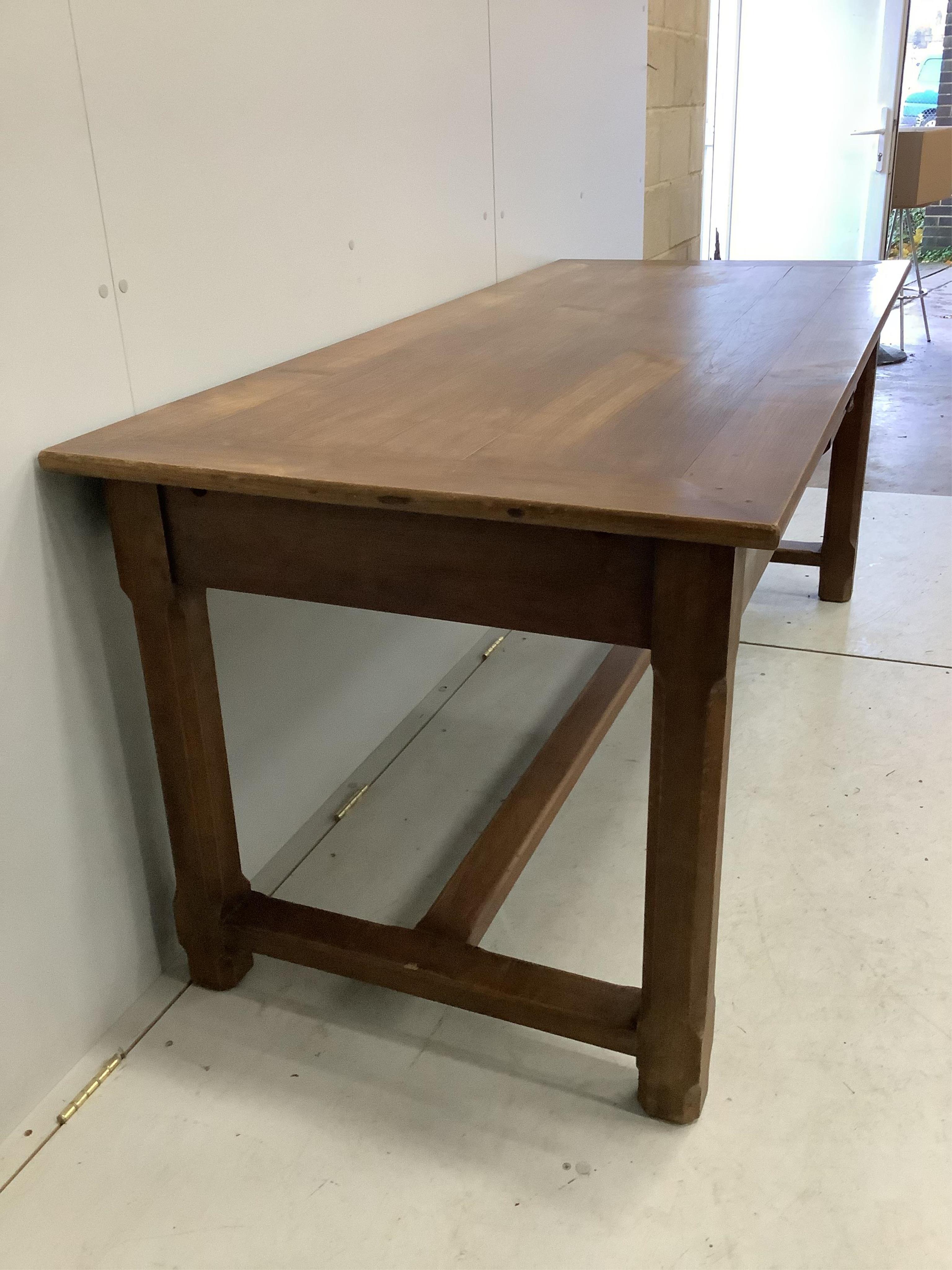 A rectangular French cherry kitchen table, width 179cm, depth 79cm, height 76cm. Condition - fair to good